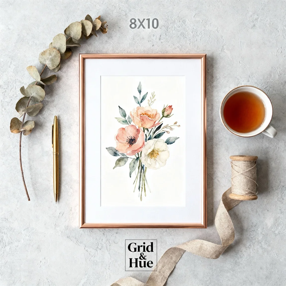 A beautifully arranged top-down flat lay showcases a framed floral print alongside complementary, aesthetically pleasing props. - ai product photography