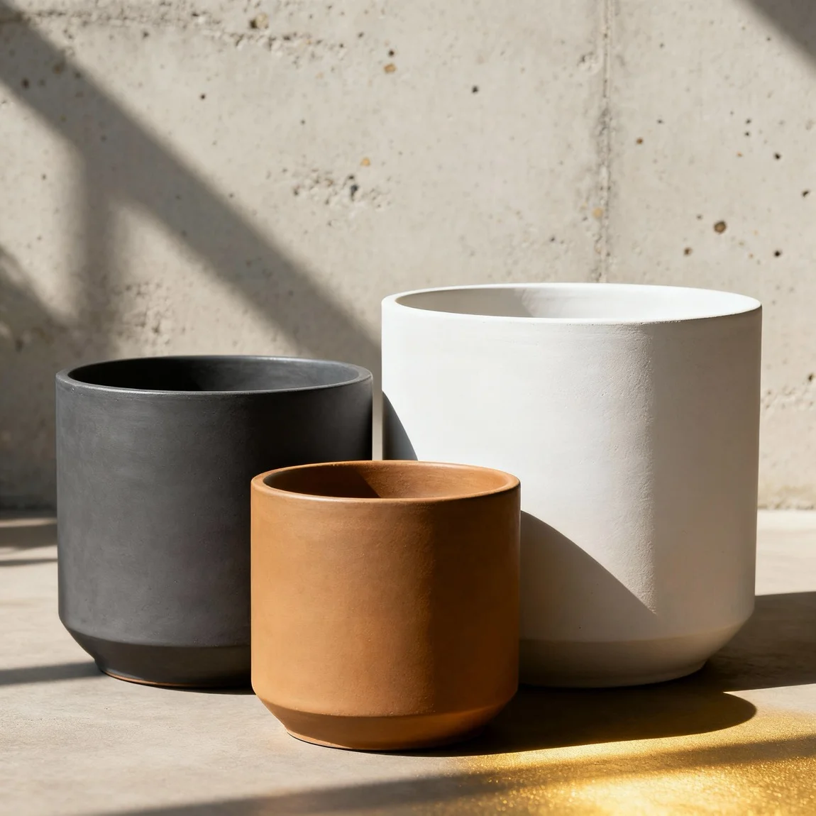 A group shot displays a 'family' of planters in different sizes and harmonious colors. - ai ecommerce photos